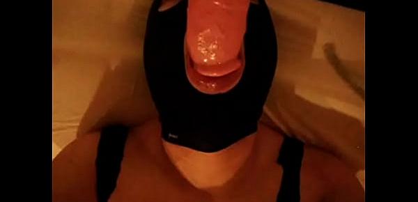  MaskMasked Asian sissy-boy transvestite sucking on dildo cock while jacking off
